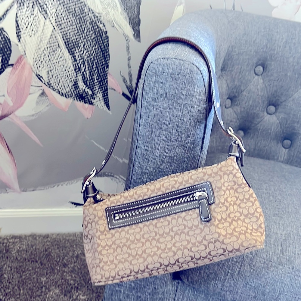 Like new miniature Coach purse. Perfect for on the go or teens!